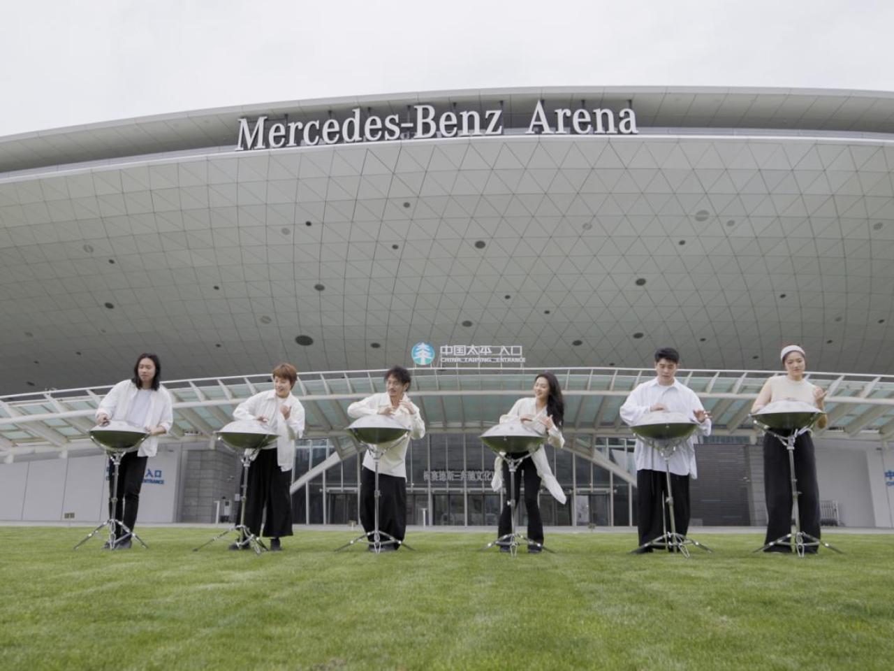 Aether band performs in front of Mercedes-Benz Arena Shanghai.
