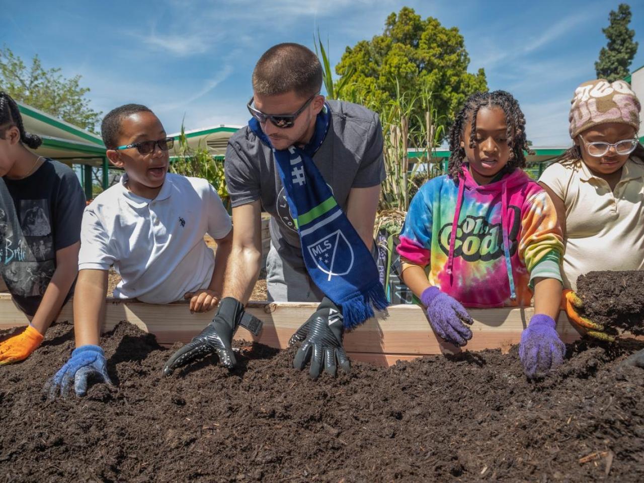 LA Galaxy Goalkeeper John McCarthy joined students to help expand and refurbish the gardens at Annalee Elementary School in Carson. 