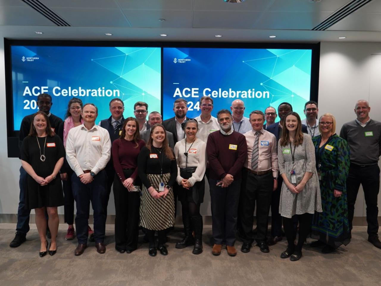 A group of employees stood together at the ACE celebration 2024