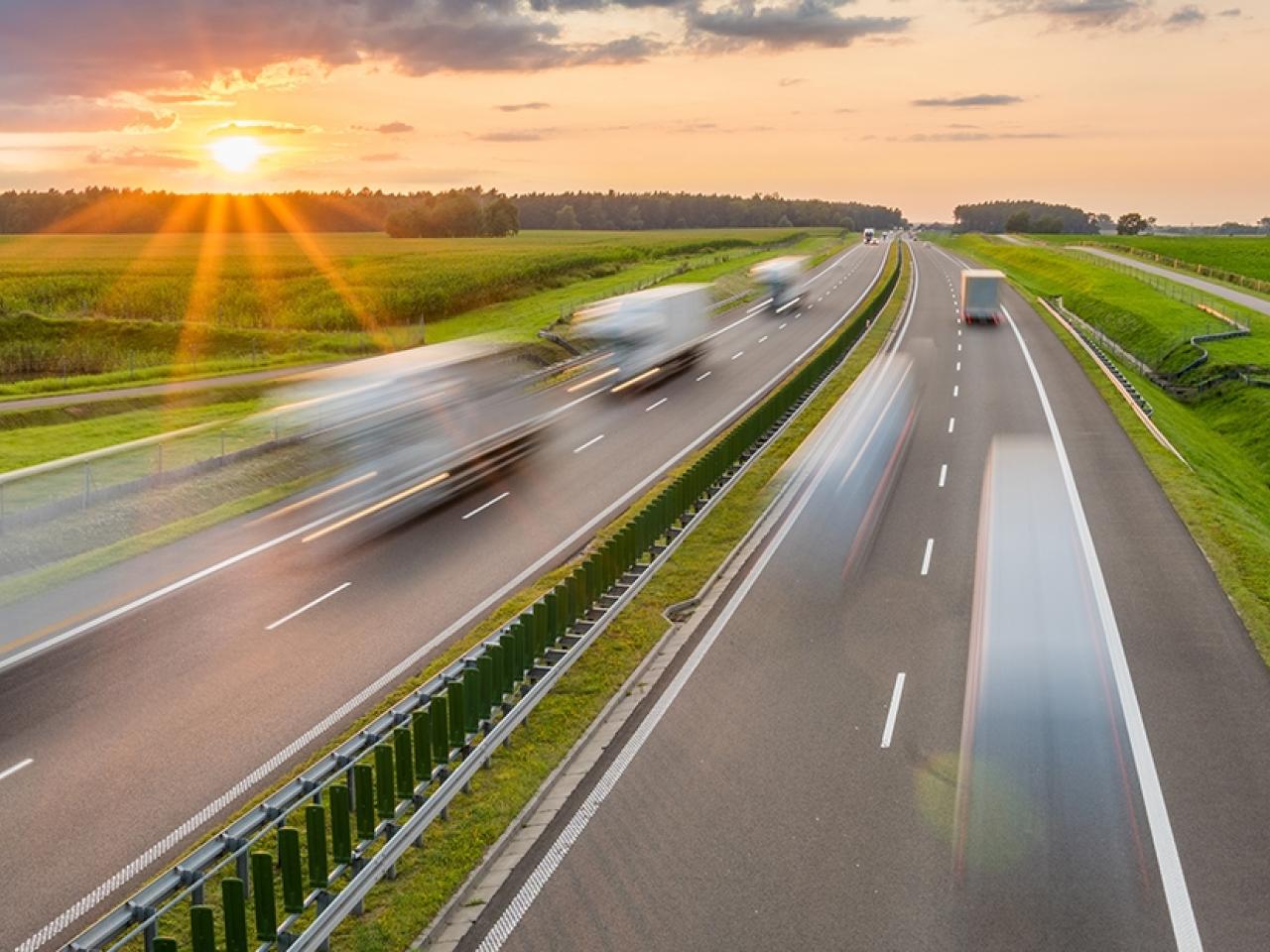 vehicles driving down a highway