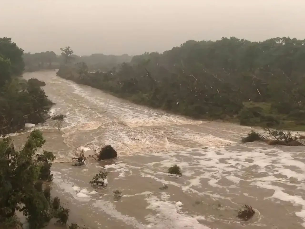 Flooding in central Texas has killed at least 80 people, many of them children. Search and rescue teams are still urgently hunting for survivors. (Photo by Gianrigo Marletta for AFP)