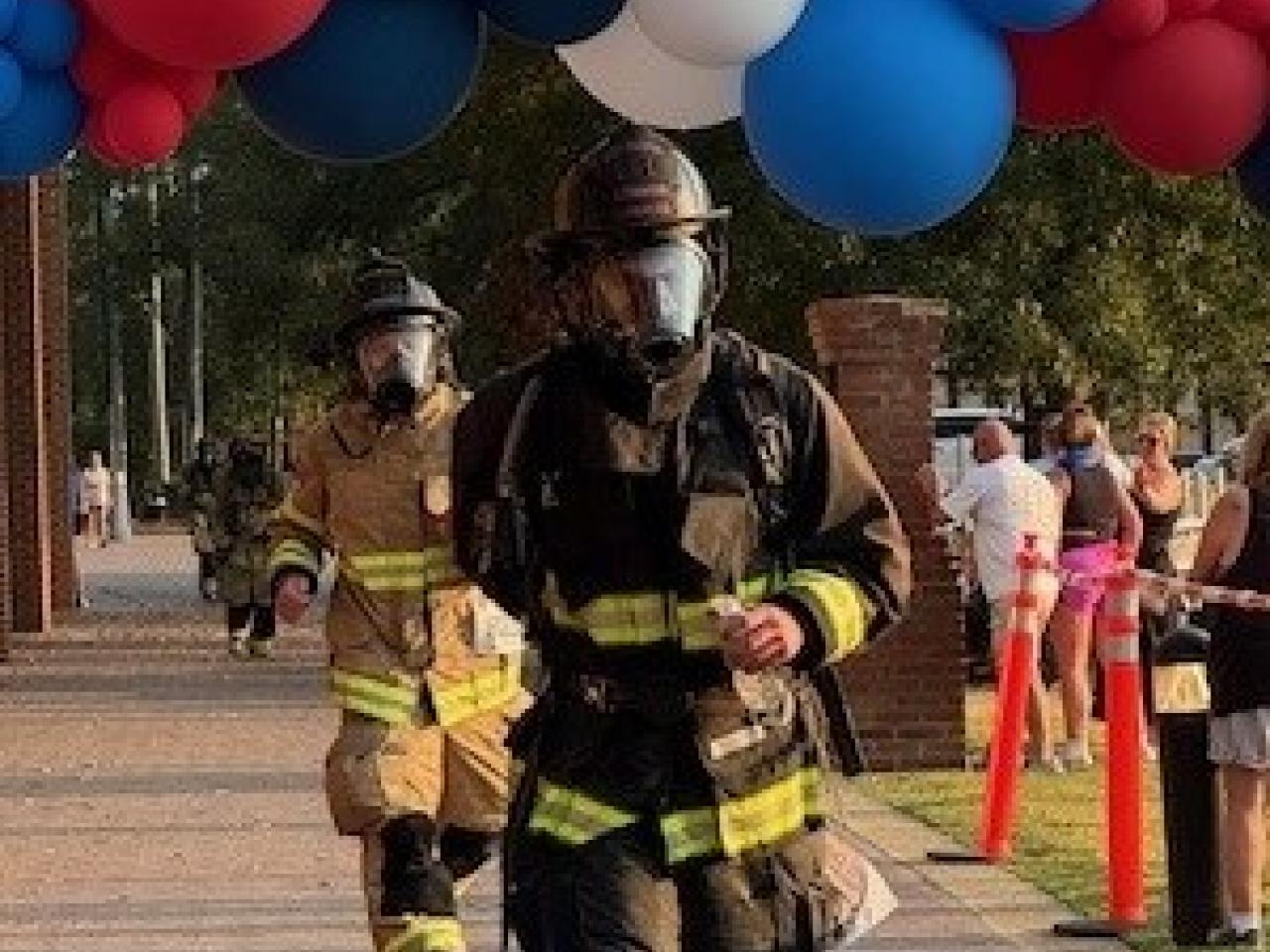 Firefighter shown in the Firefighter 5K race for CURE Childhood cancer.