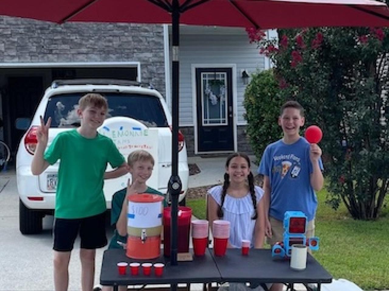 Rowan and his friends at his lemonade stand.
