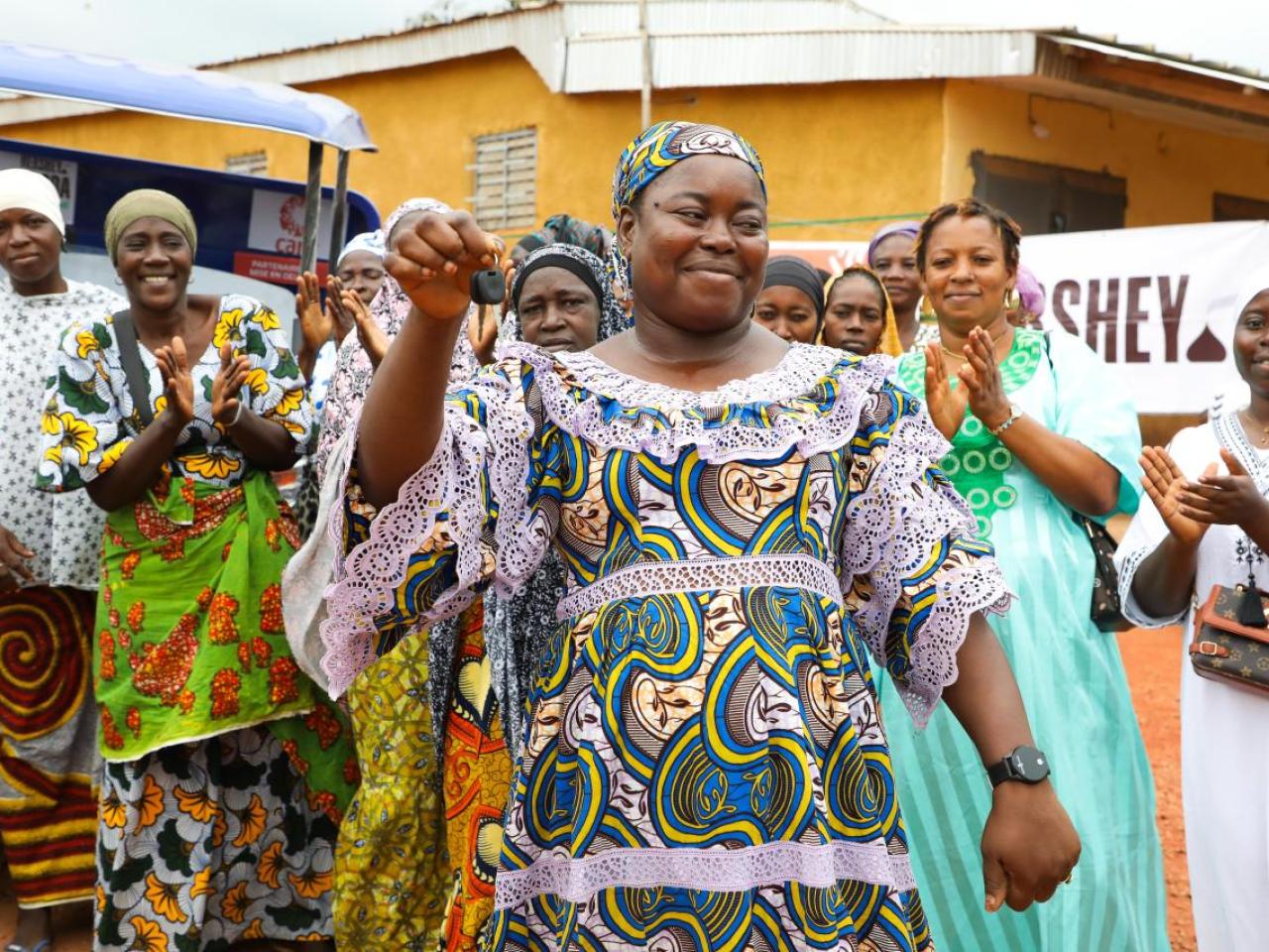 Community with women leaders at the front