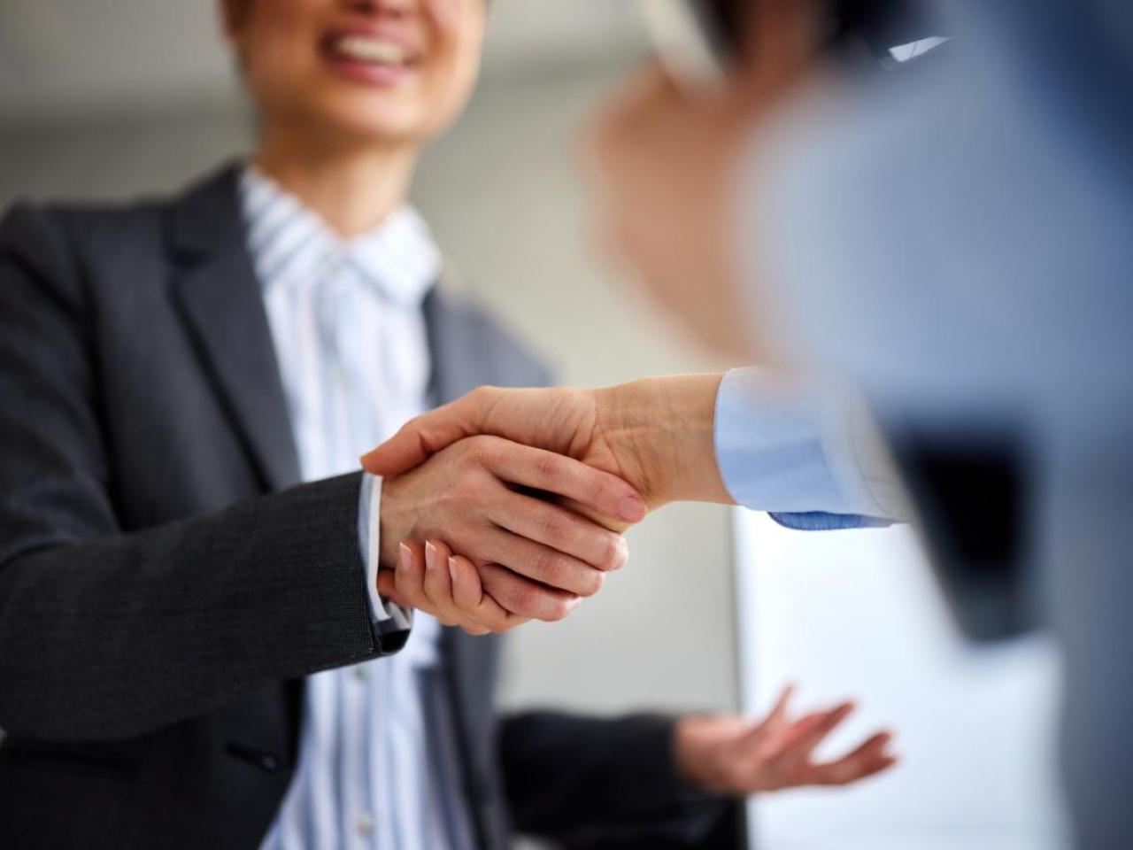 Close up of a handshake
