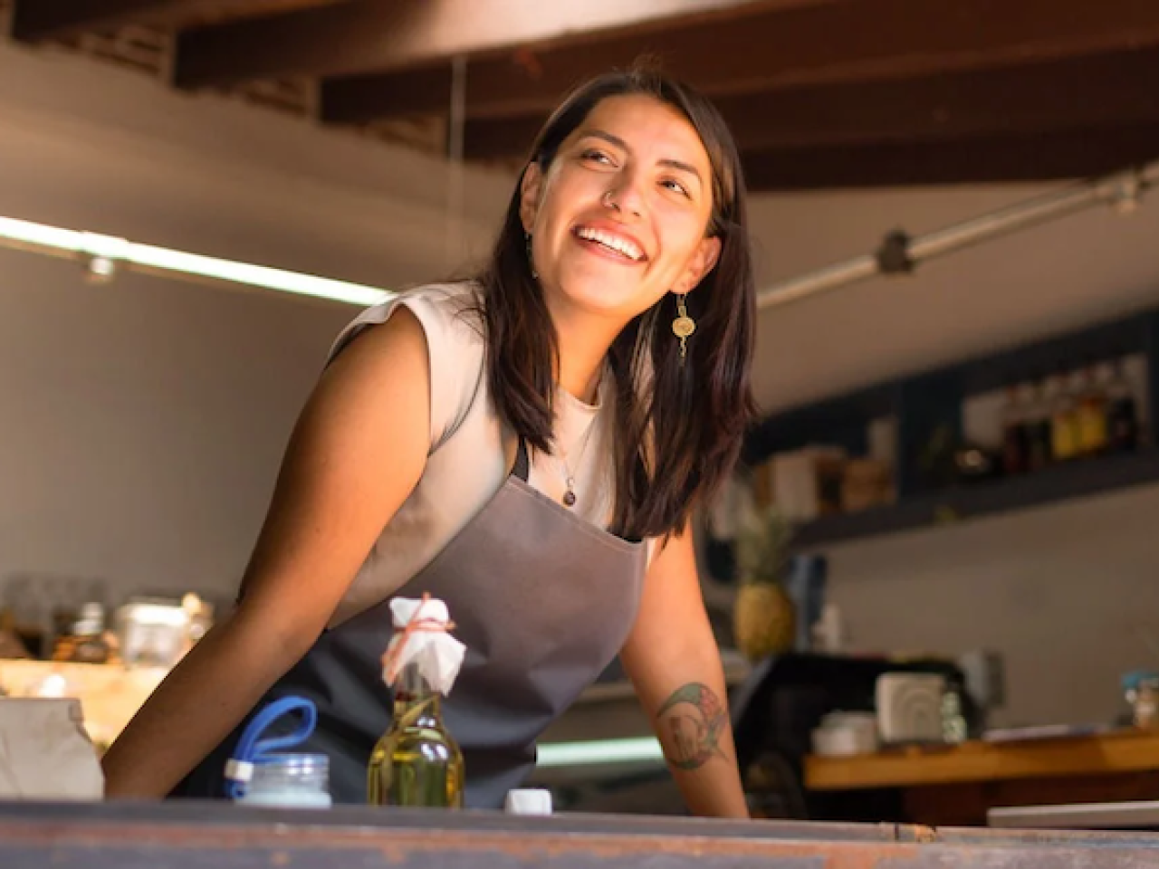 A woman in an apron.