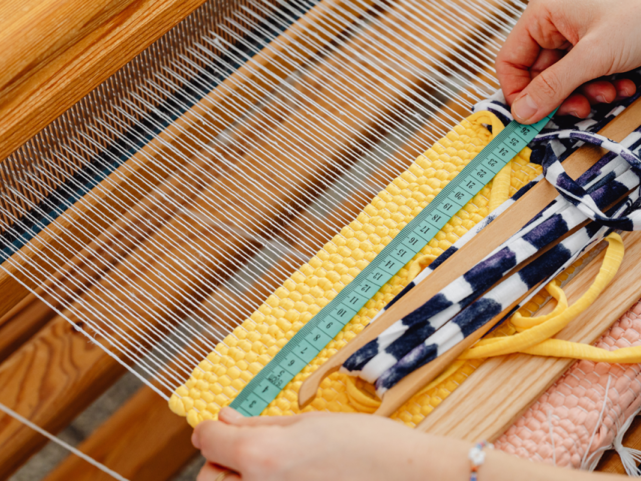 Fibers on a hand loom