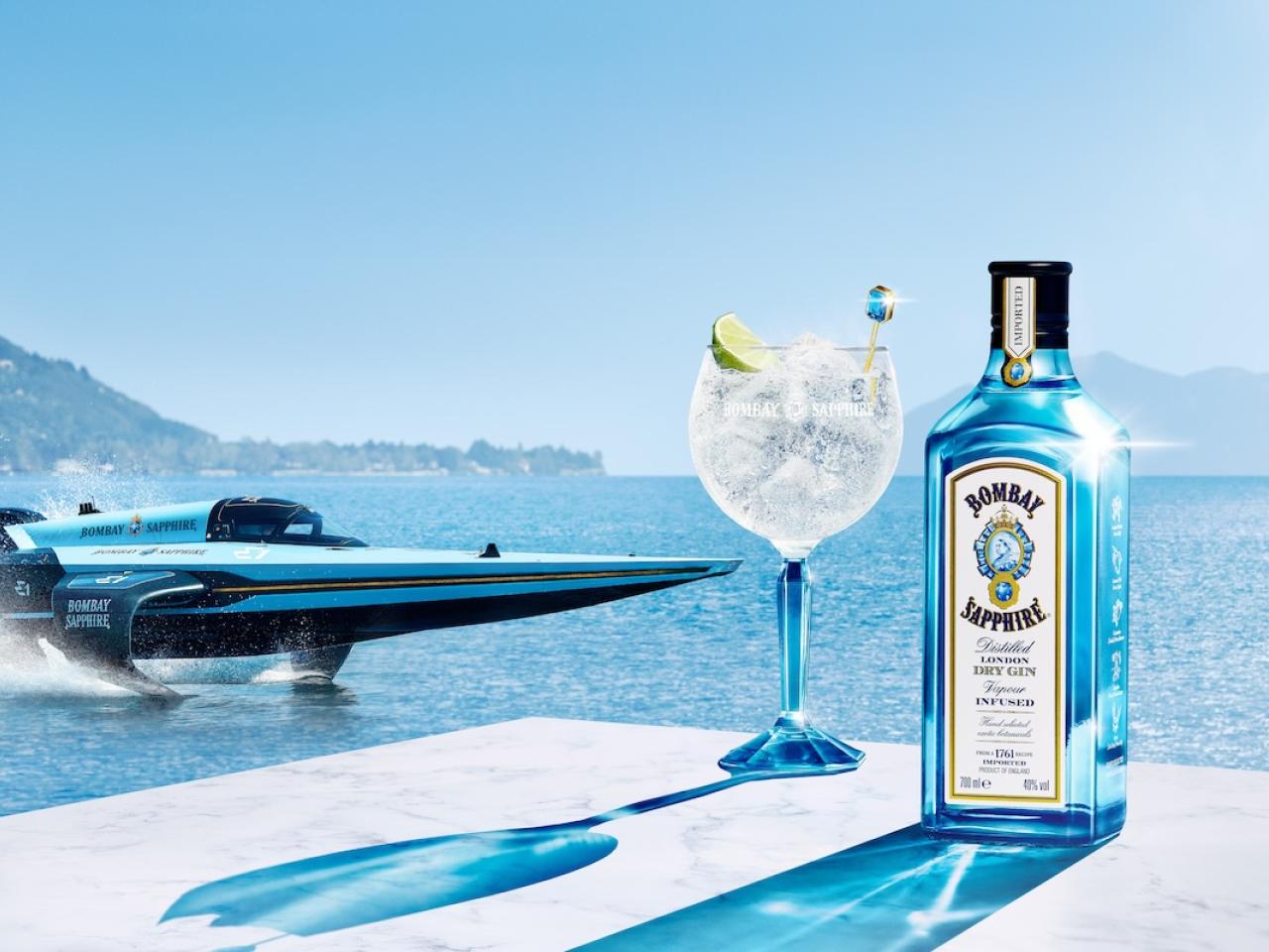Speedboat pictured next to bottle and glass of Bombay Sapphire