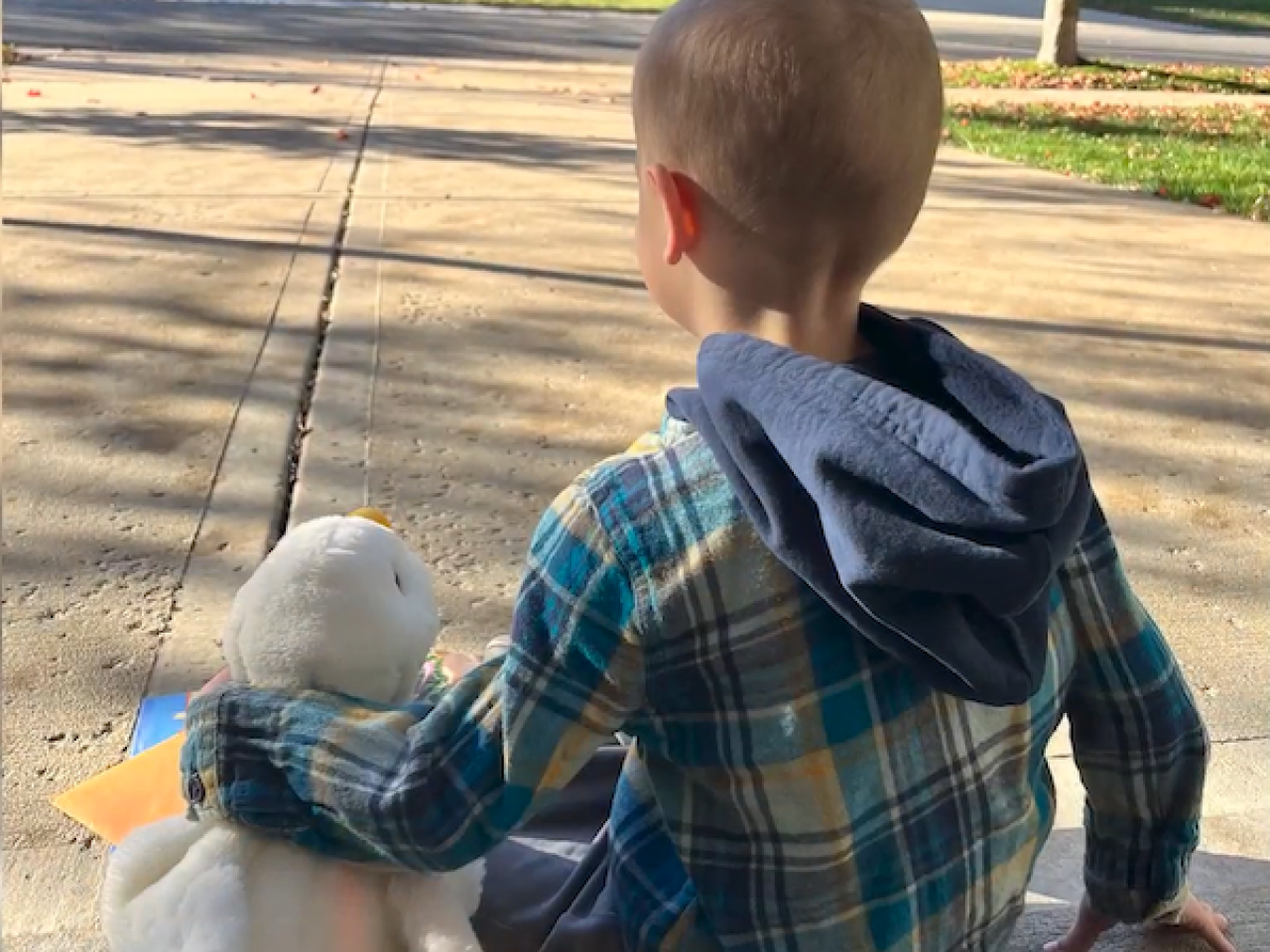 Young boy shown with My Special Aflac Duck.