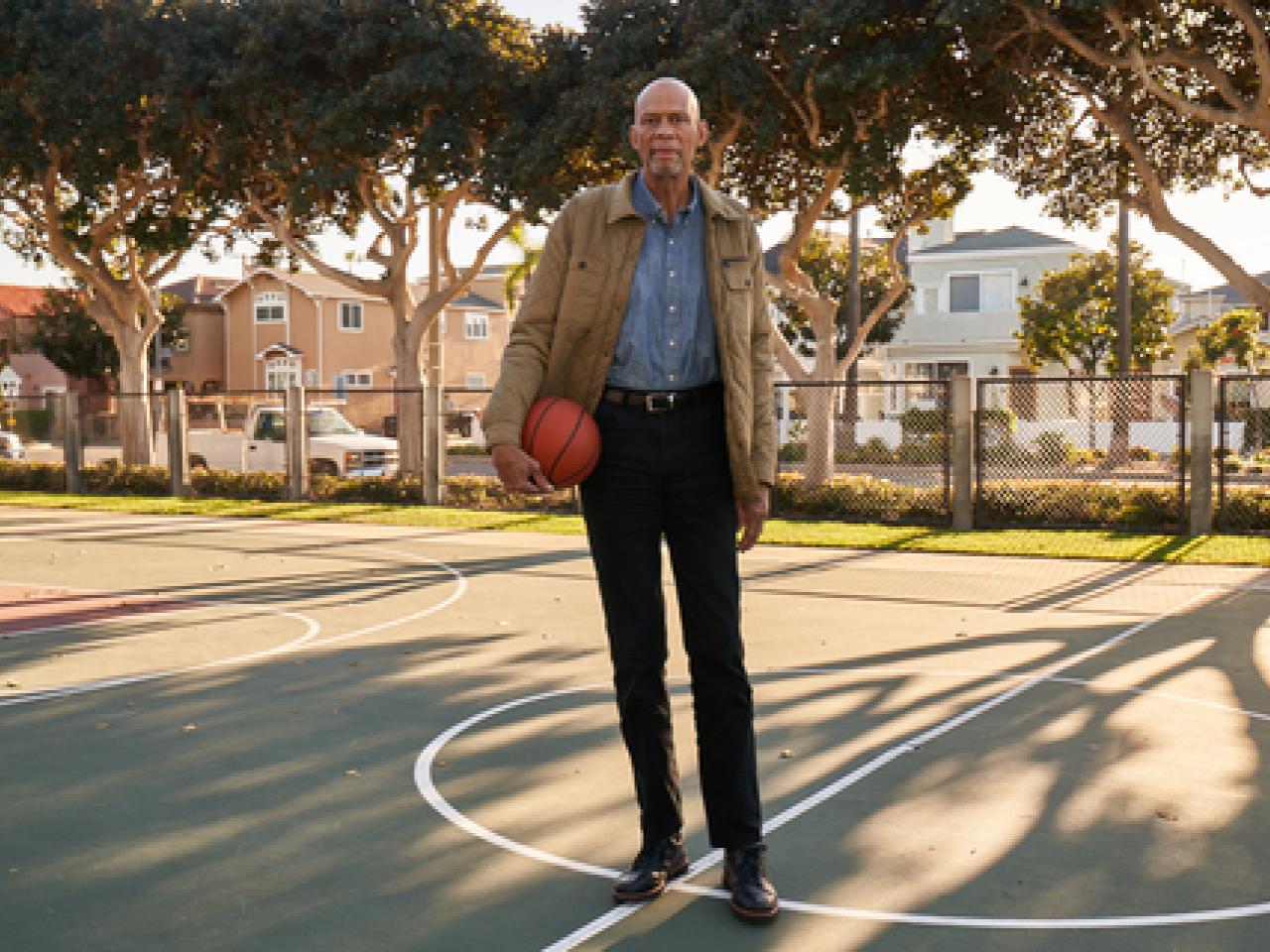 Kareem Abdul-Jabbar shown on a basketball court.