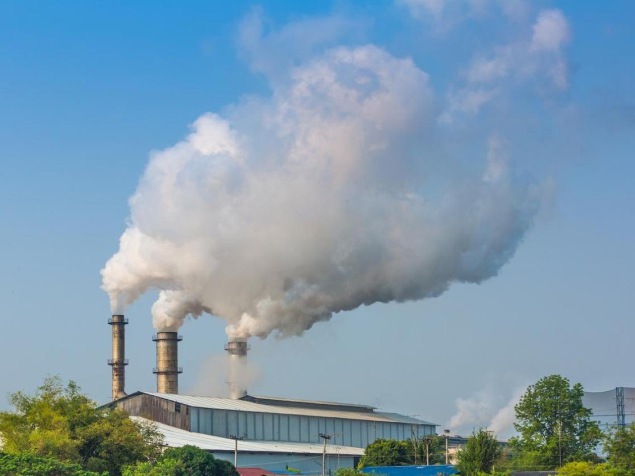 Clouds of gas emerging from smokestacks