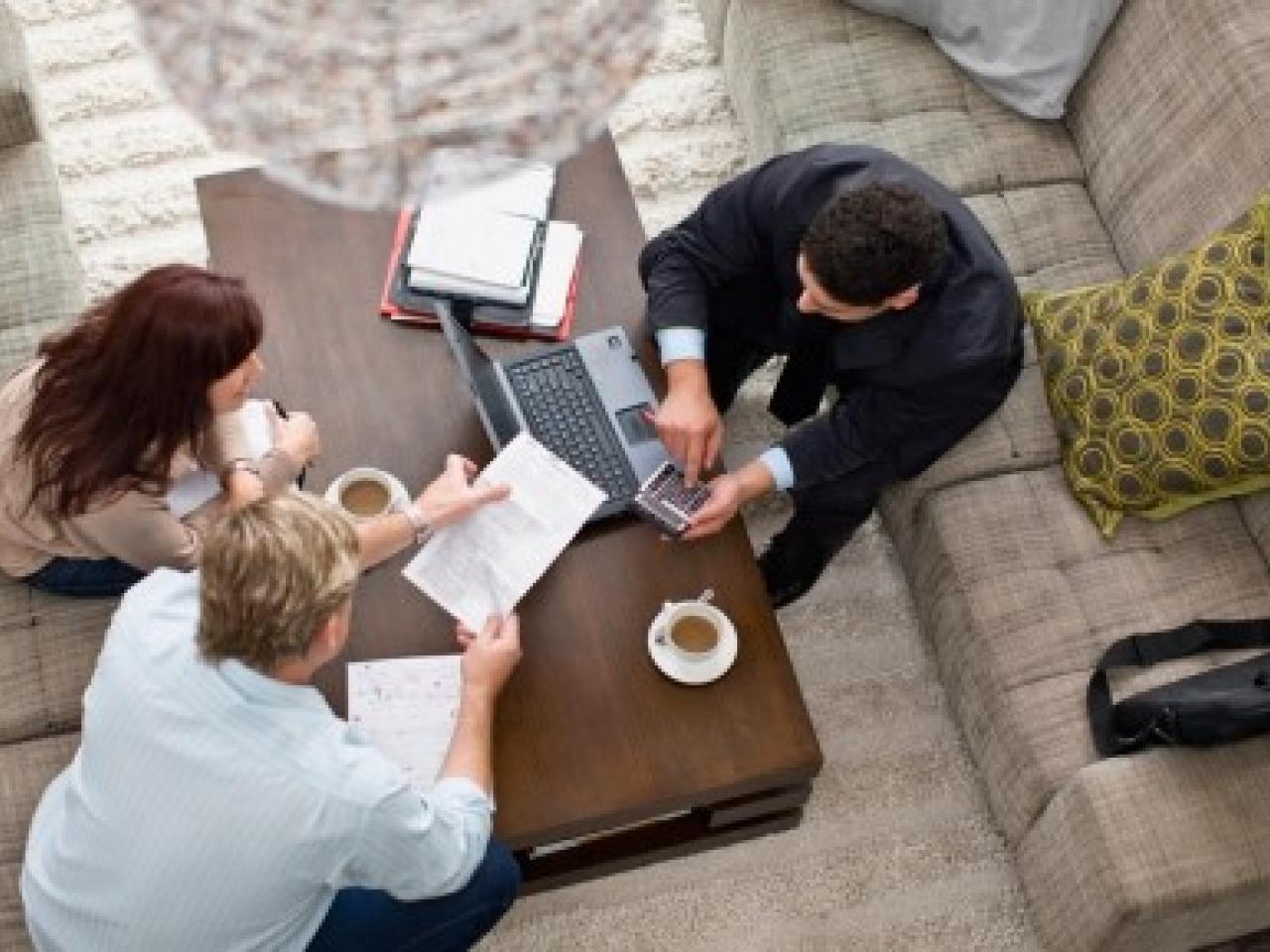 Aerial shot of three people working in office