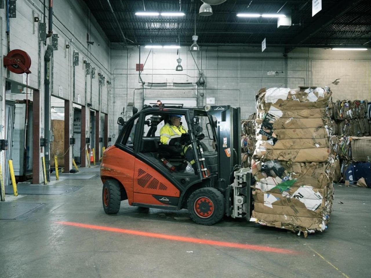 Recycling being loaded on forklift