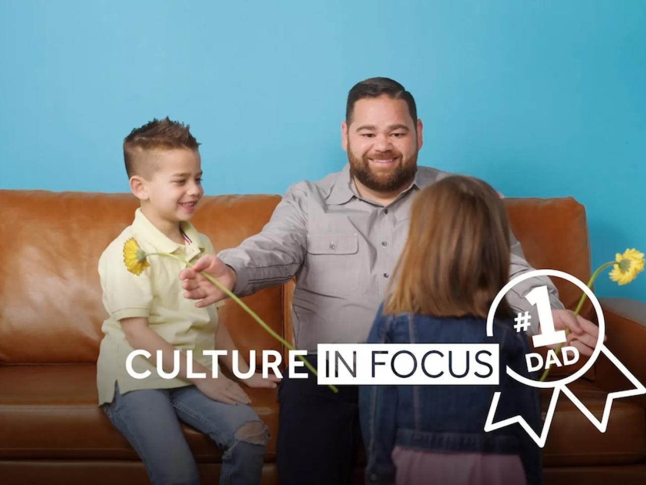 NRG Culture in Focus: Number 1 Dad. Father shown with his two children.