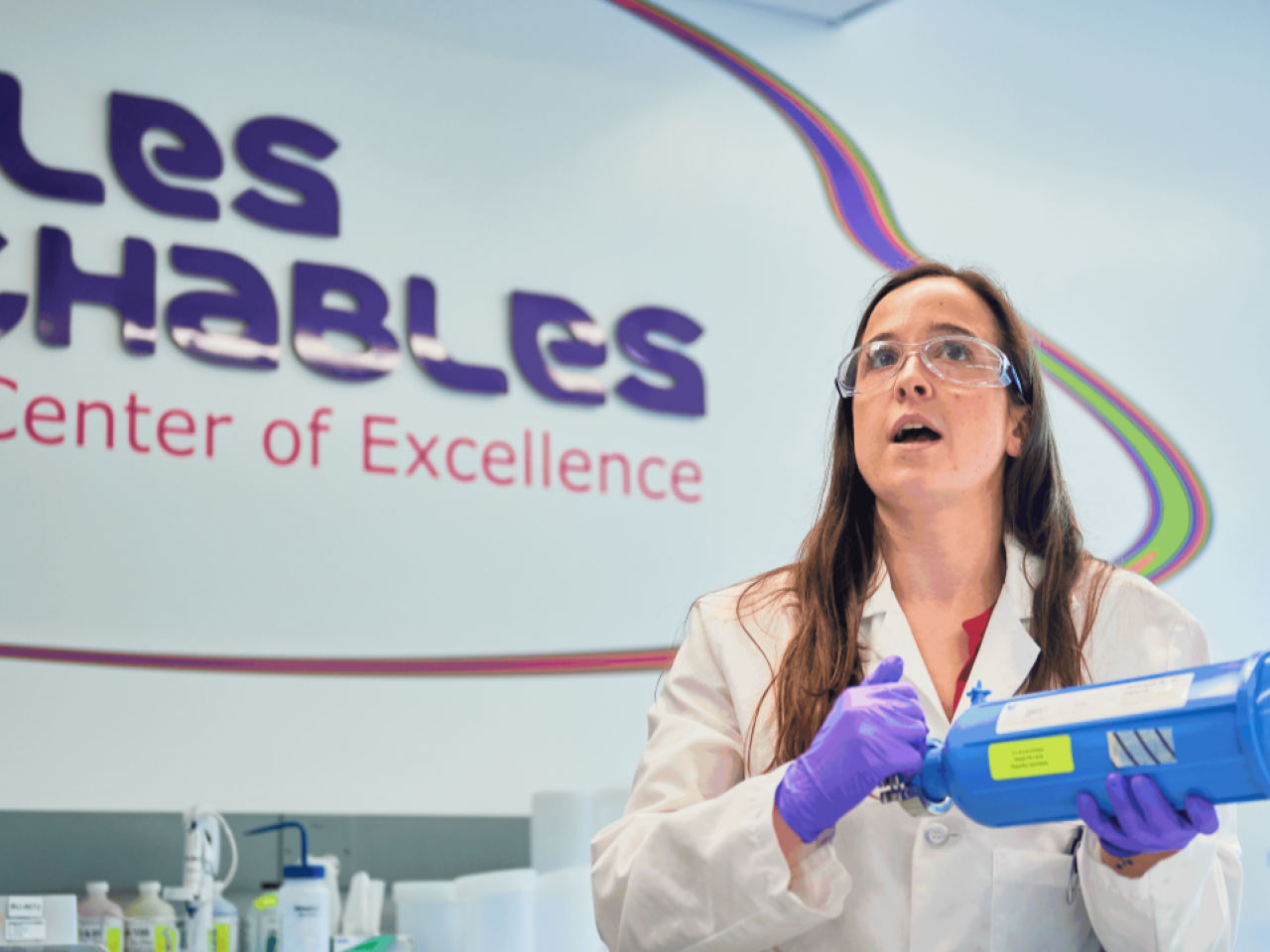 MilliporeSigma scientist holds product