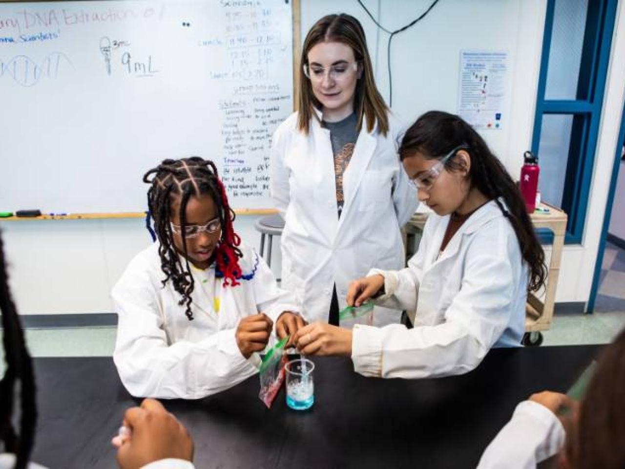 Staff Engineer Allie Duchnak works with students at San Diego's Elementary Institute of Science, as part of Illumina's Future is Bright campaign. | Photo: Kristy Walker