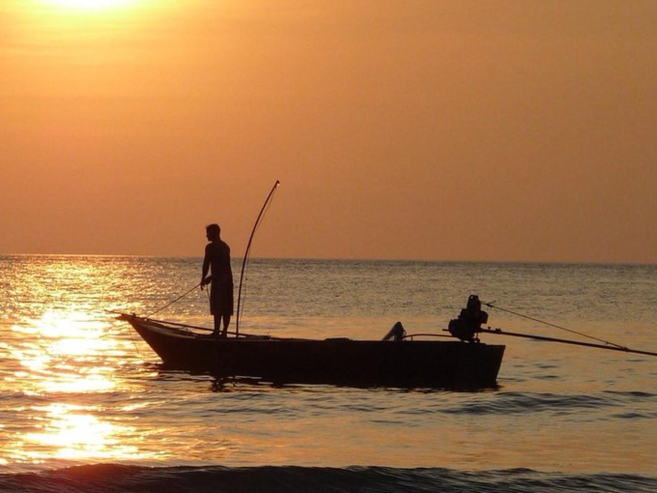 Fishing boat in the sunset