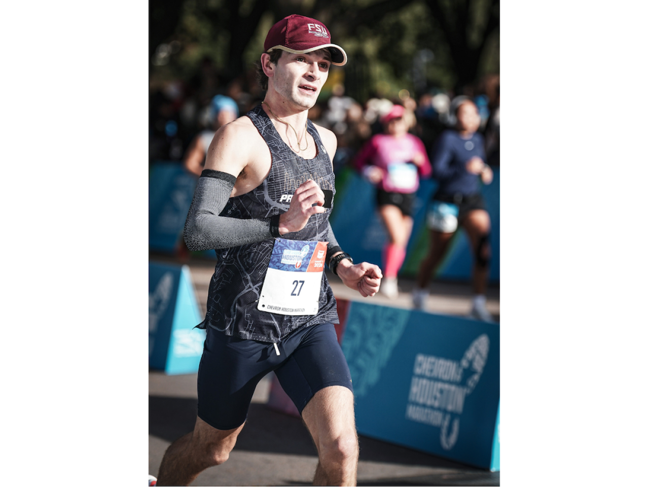 Joe Farley running in Chevron Marathon.