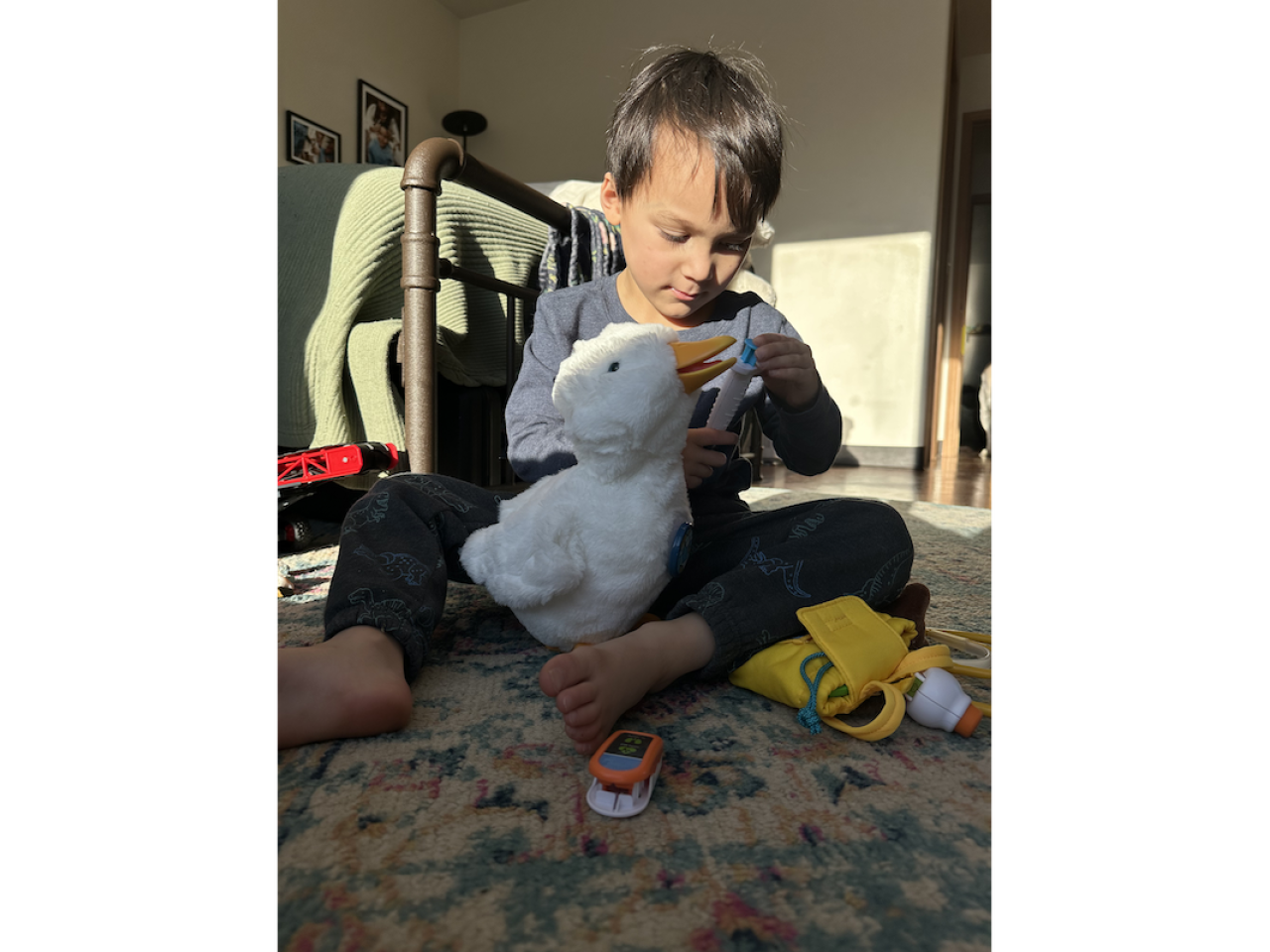 Arlo holding his feathered friend