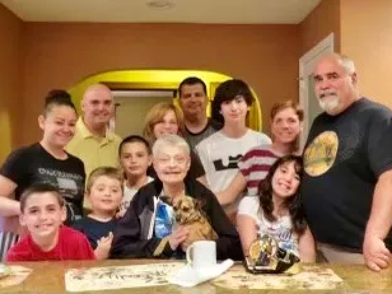 Gerri Kuo surrounded by family