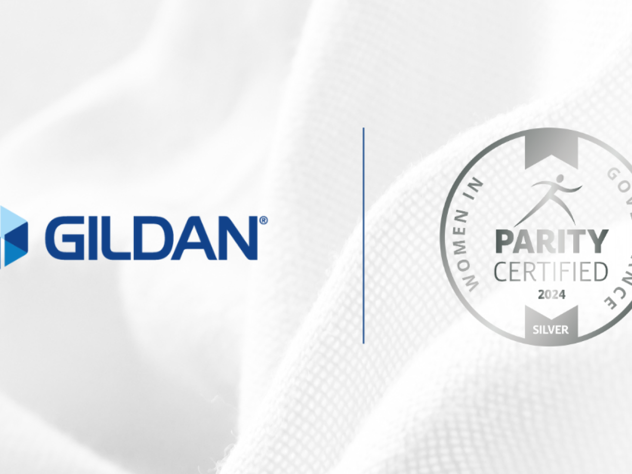 Gildan logo and Women in Governance Silver Level Parity Certified Logo against a white fabric backdrop