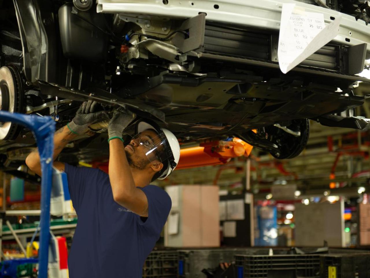 person working on a vehicle