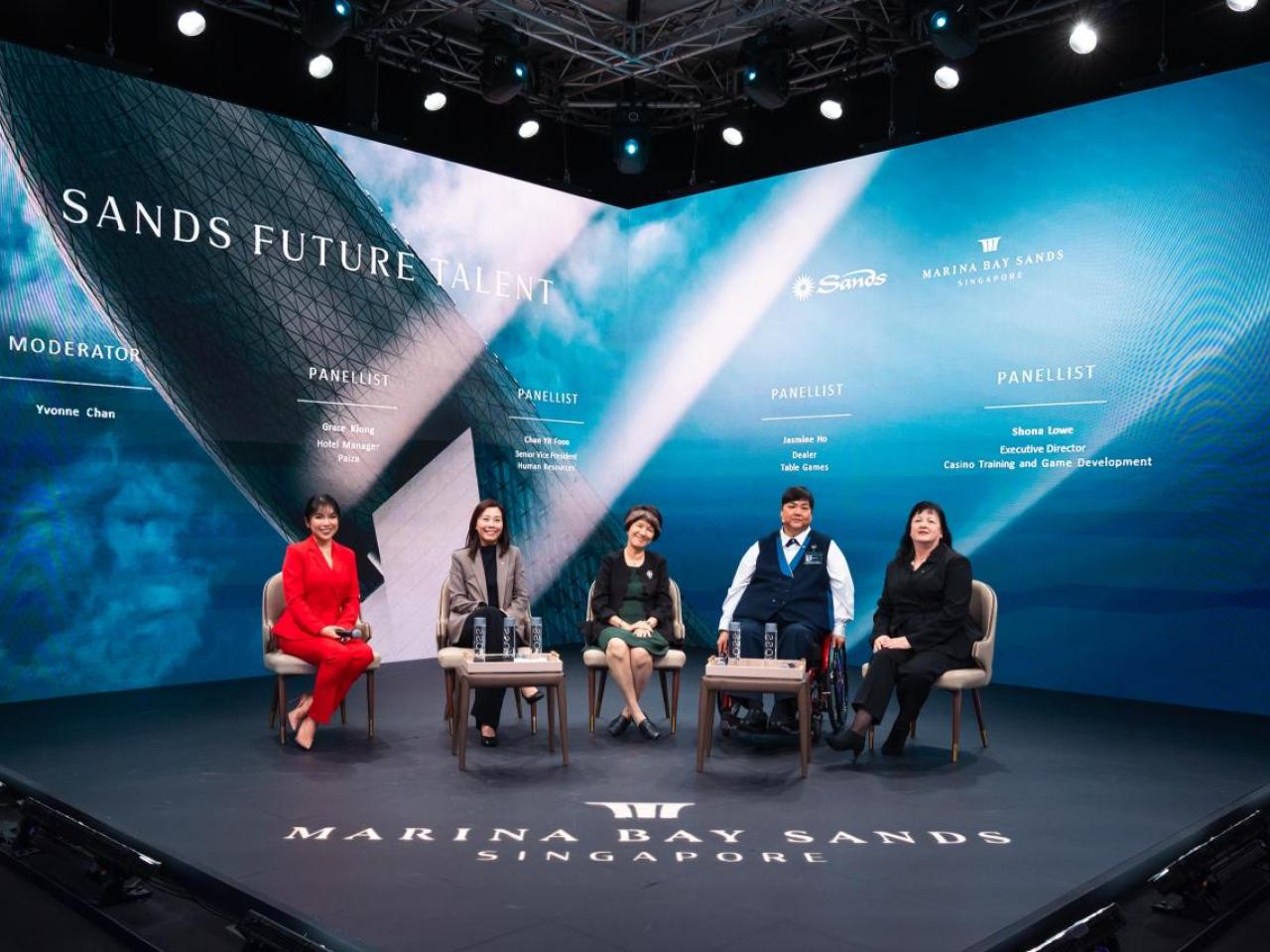 Five panelists seated together