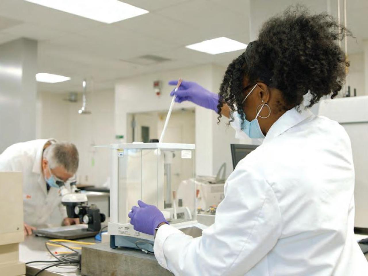 Two people at work in a lab