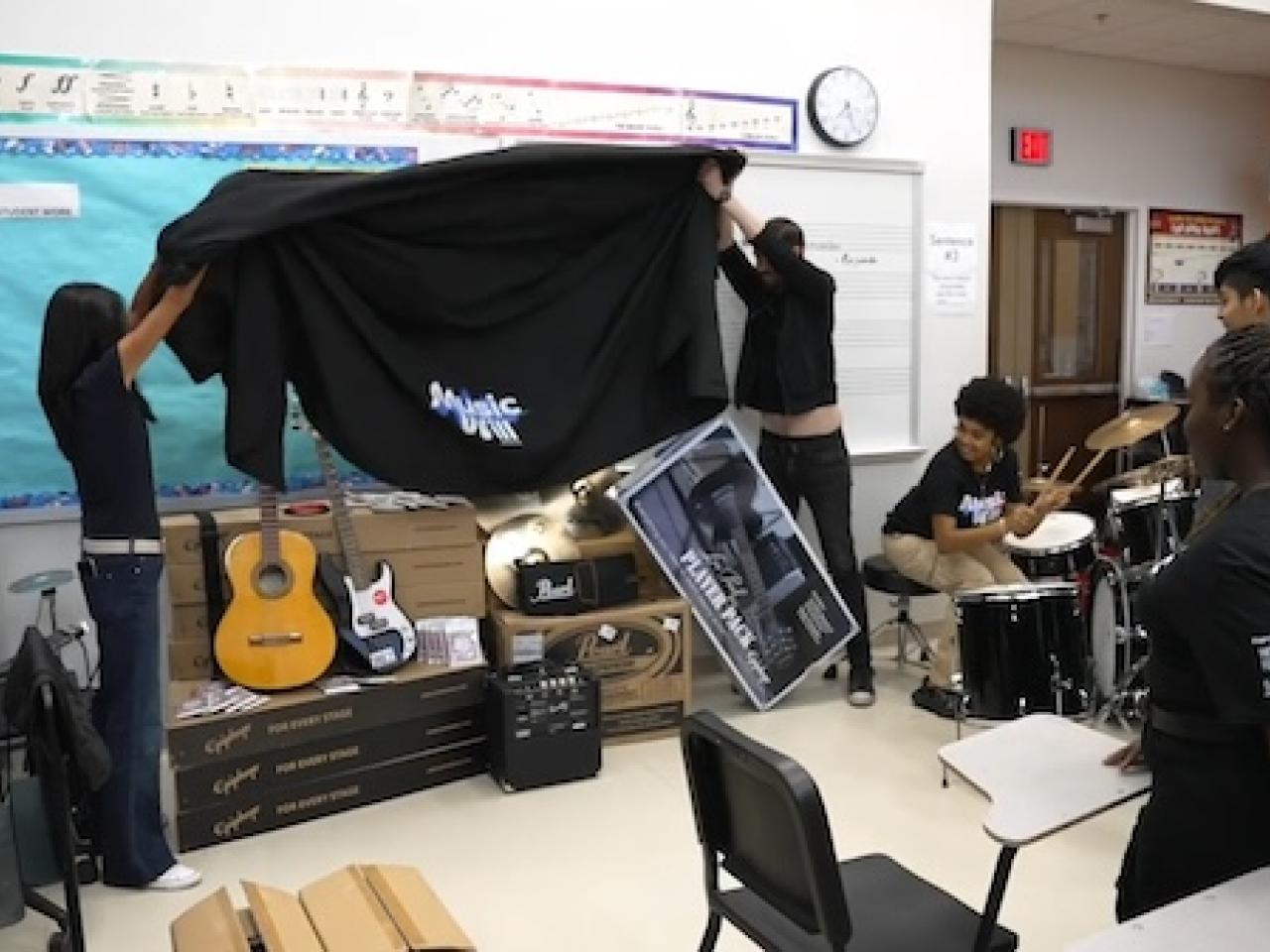 Unveiling the musical instruments at John C. Fremont High School.
