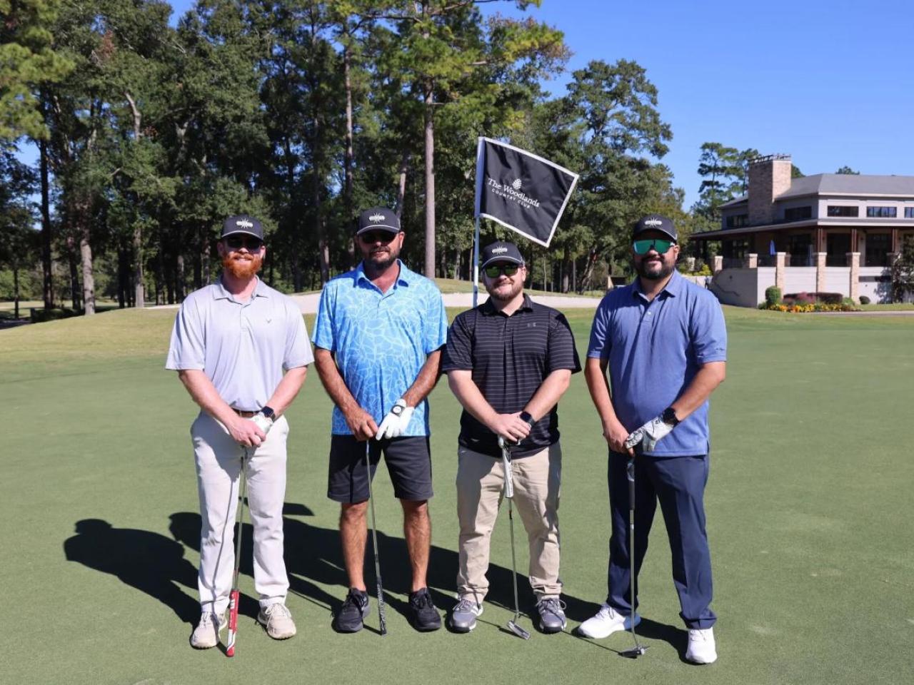 Four golfers