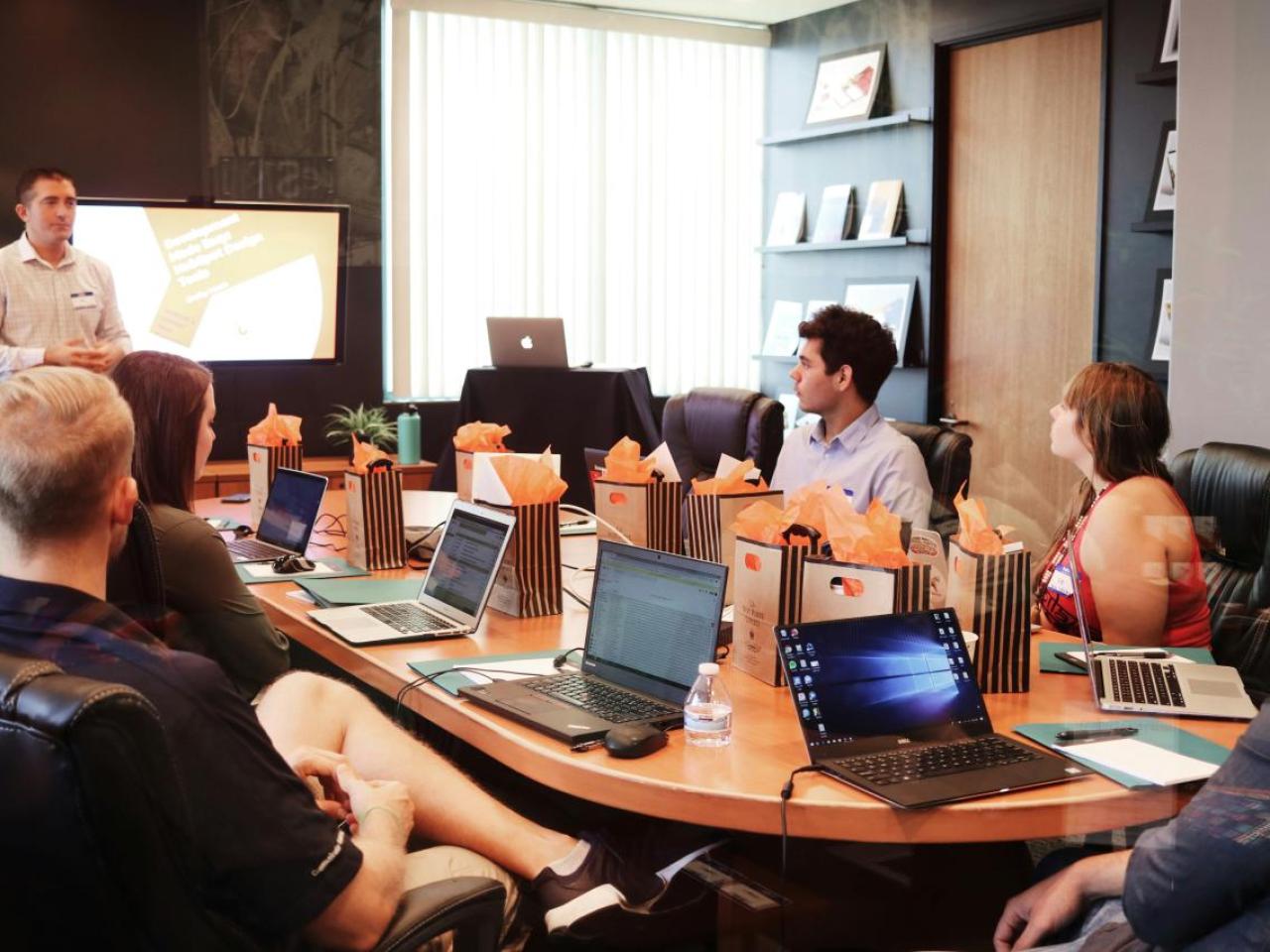 Employees in a conference room.