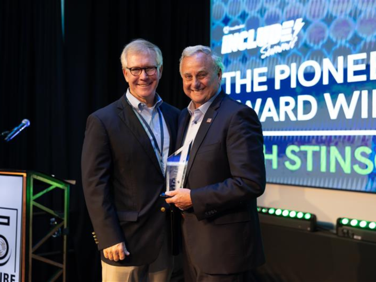 Southwire's Chief Supply Chain Officer, Charlie Murrah, presenting Southwire CEO Rich Stinson with the Pioneer Award