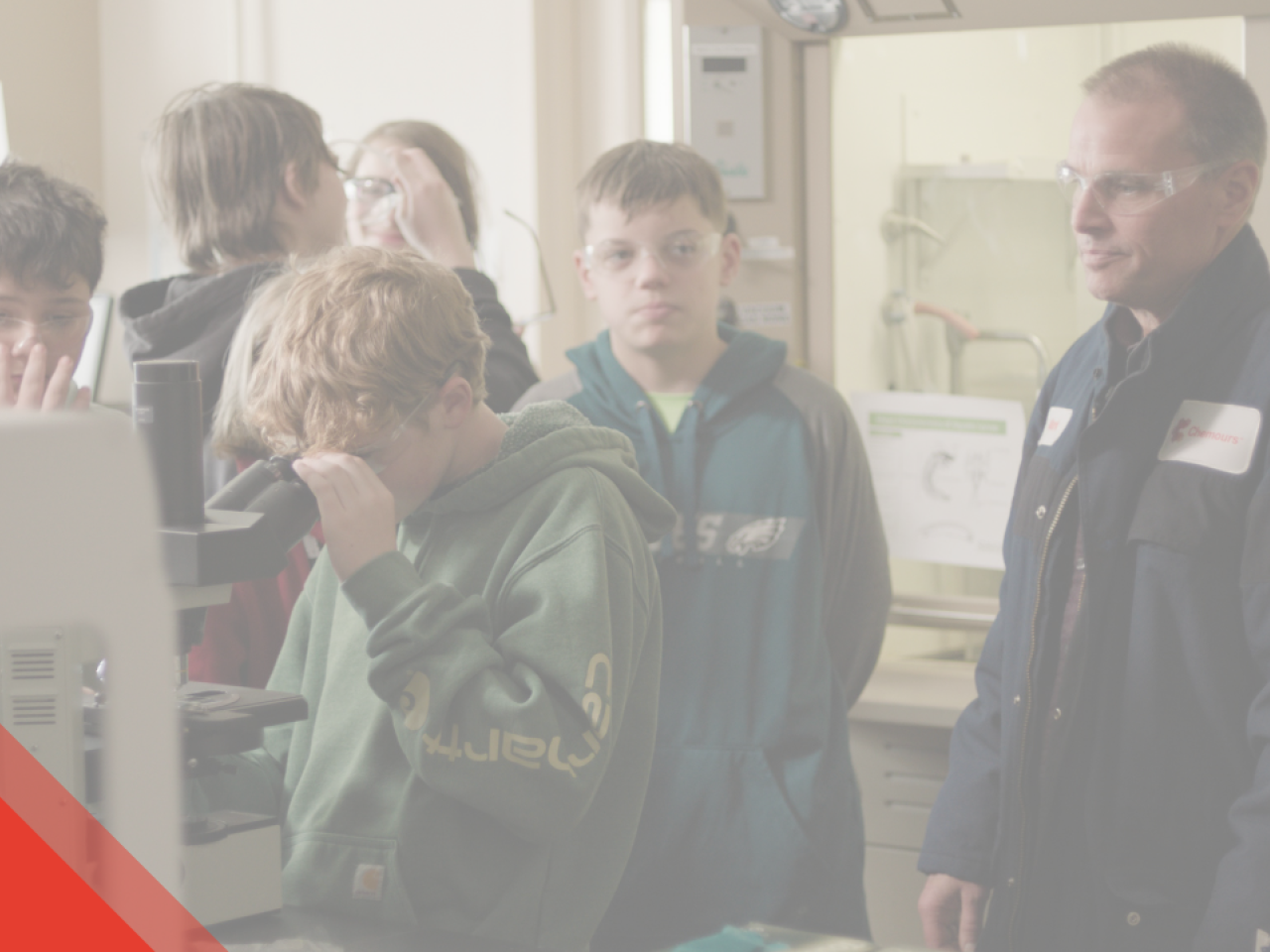 Students in a lab with their instructor