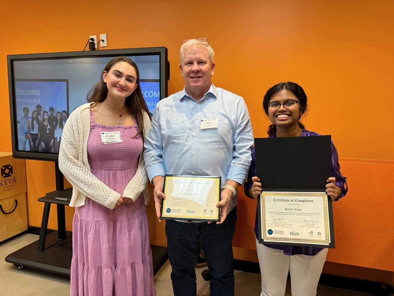 Maximus leader and interns celebrate the end of their summer program