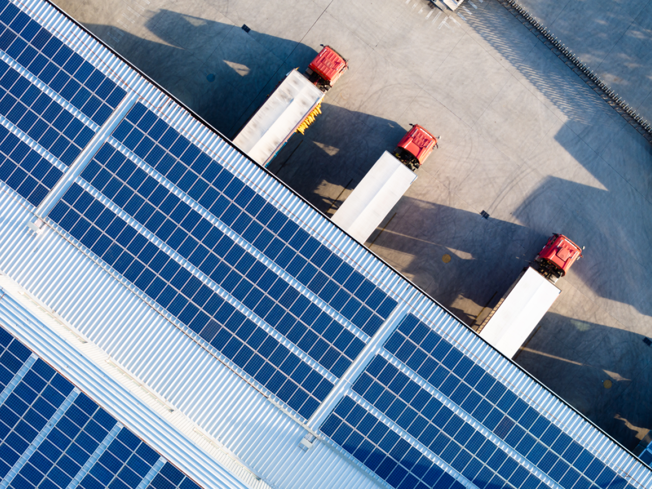 solar panels and truck trailer at rooftop facility