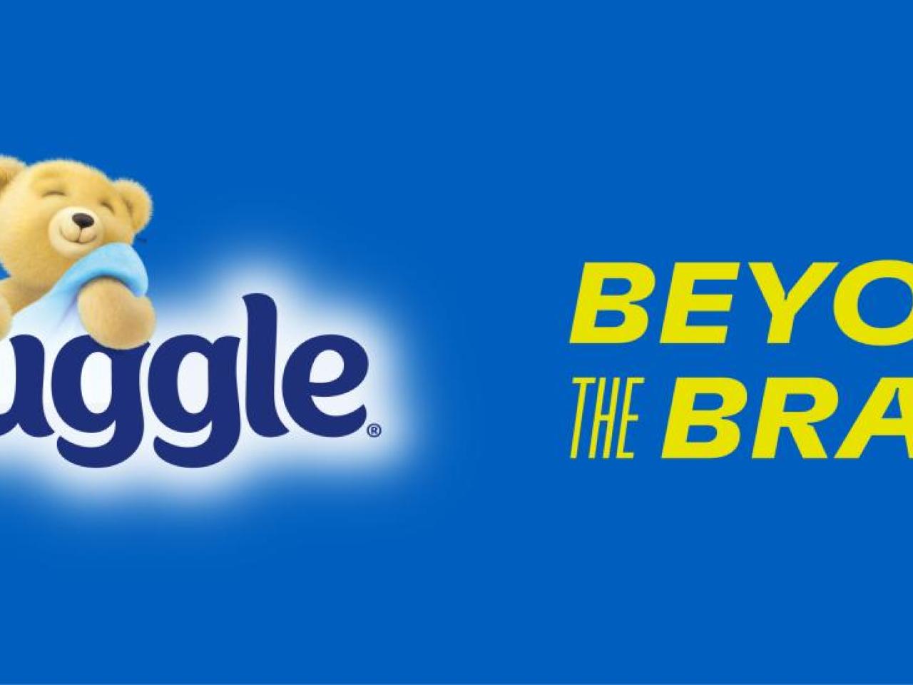 Snuggle logo with the text "beyond the brand"