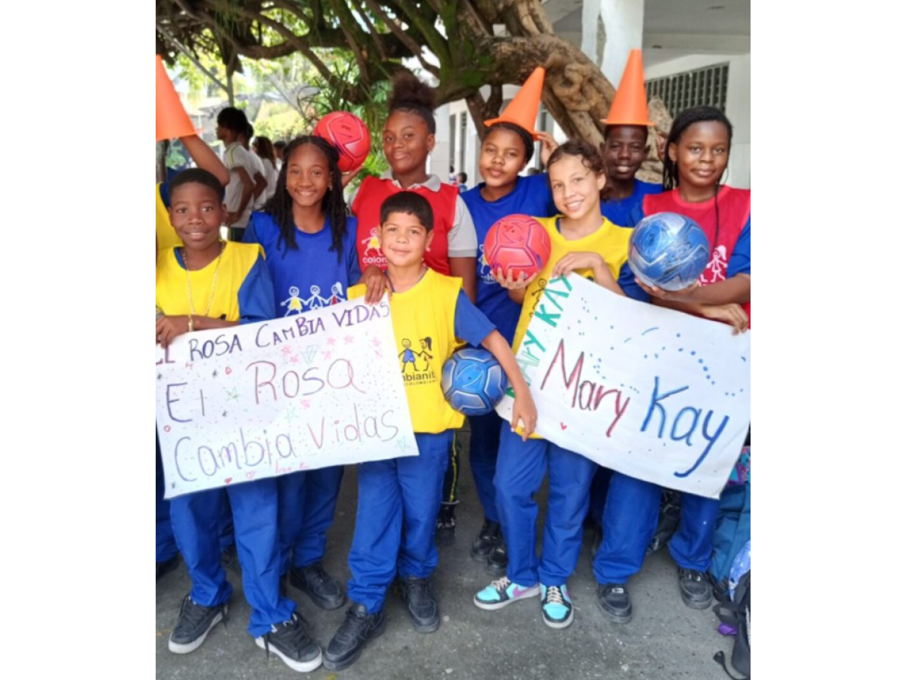 students holding up signs