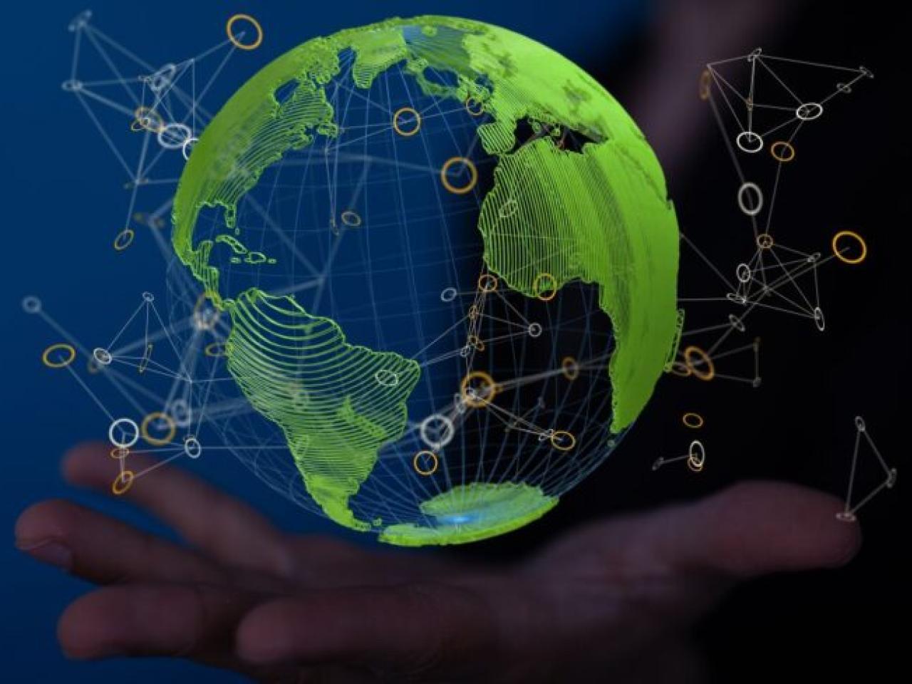 Globe shown in the palm of a hand.