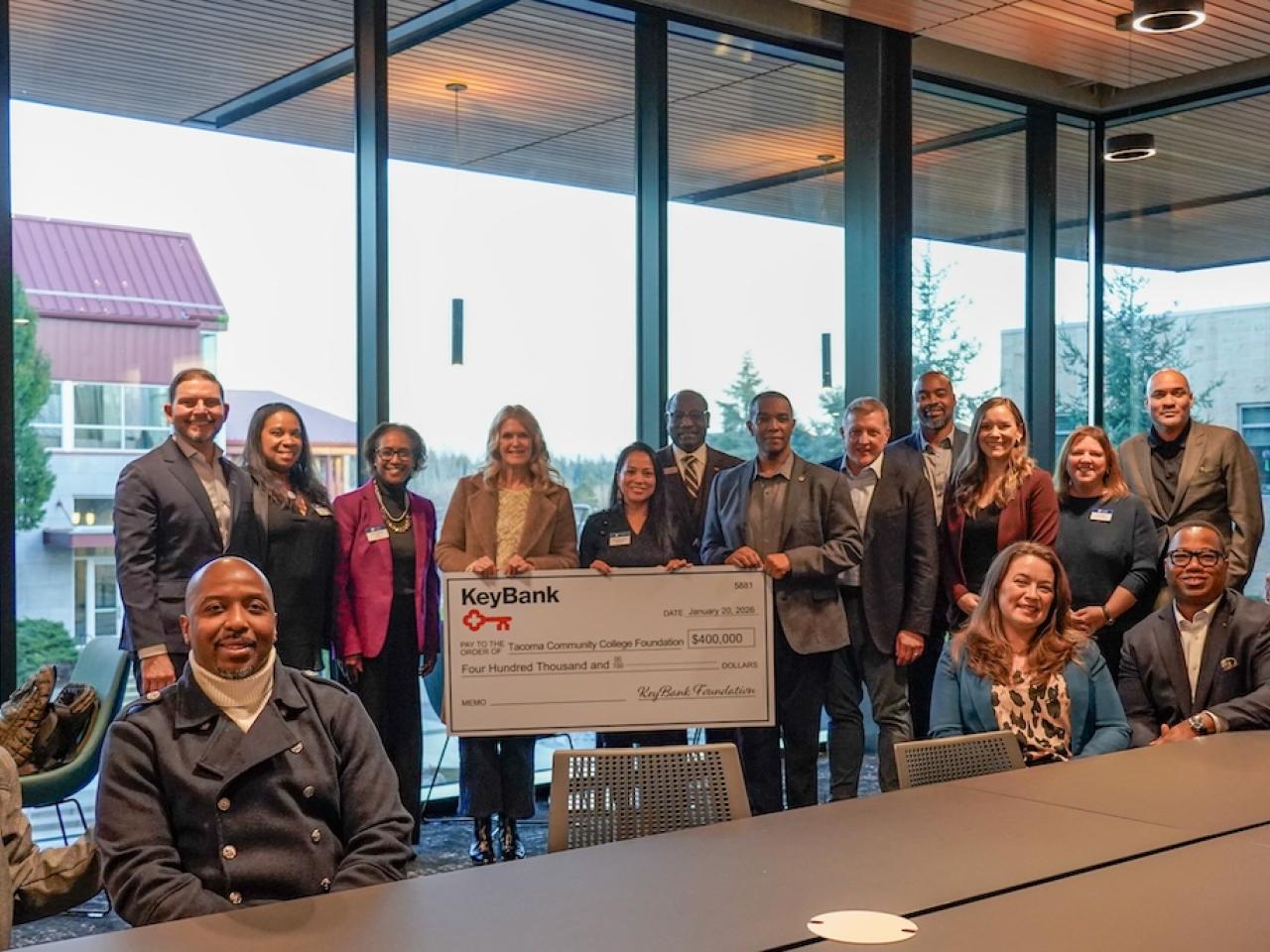 Representatives from Tacoma Community College and KeyBank shown with a $400,000 grant check.