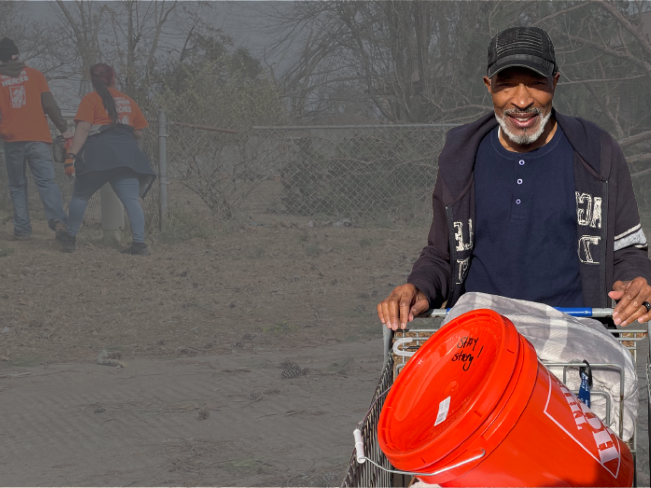 Home Depot volunteer with supplies.