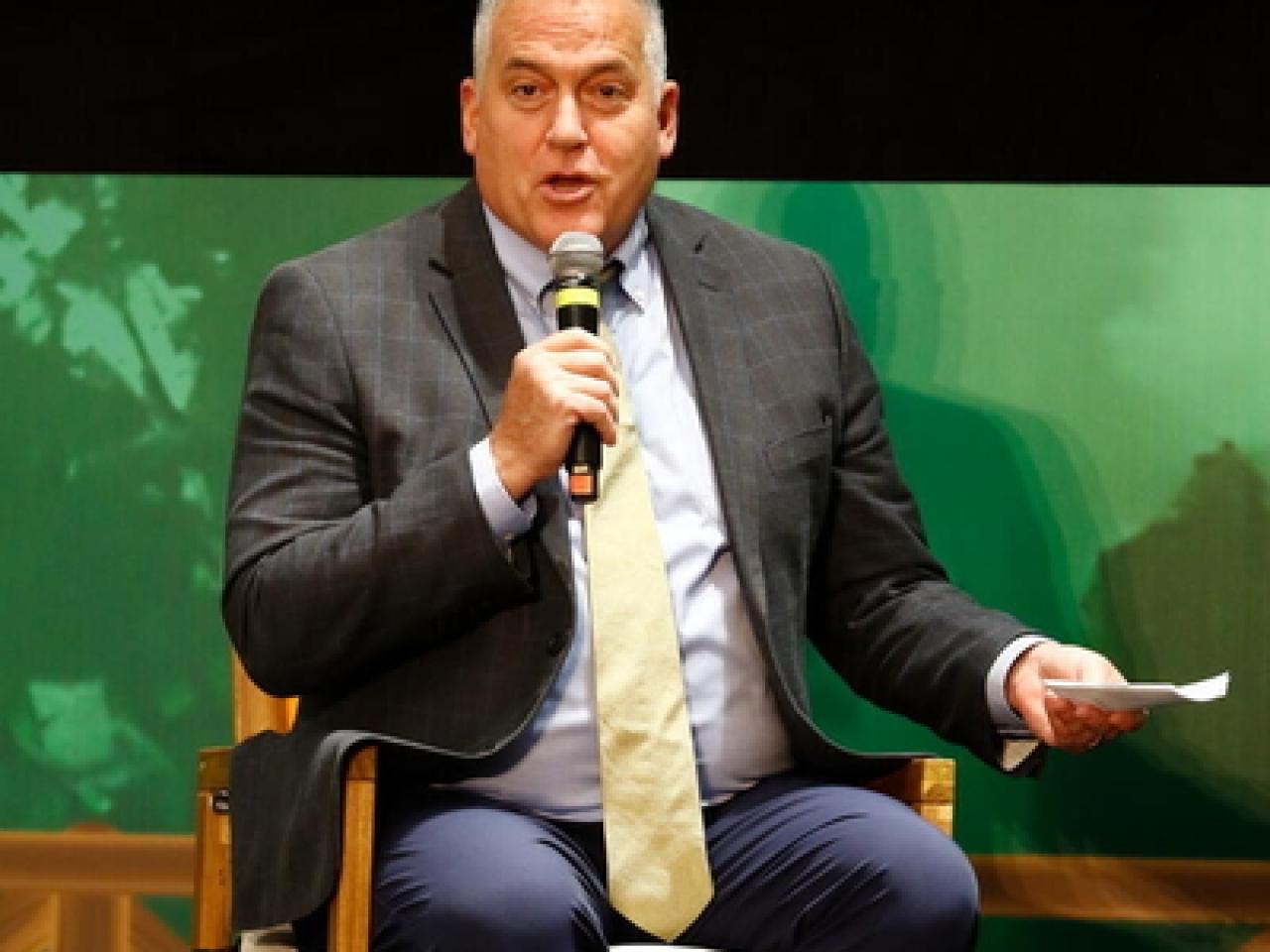 Dan Lambe, CEO of the Arbor Day Foundation, speaks on stage during the First International Green Cities Conference at FAO's headquarters in Rome, Italy. 