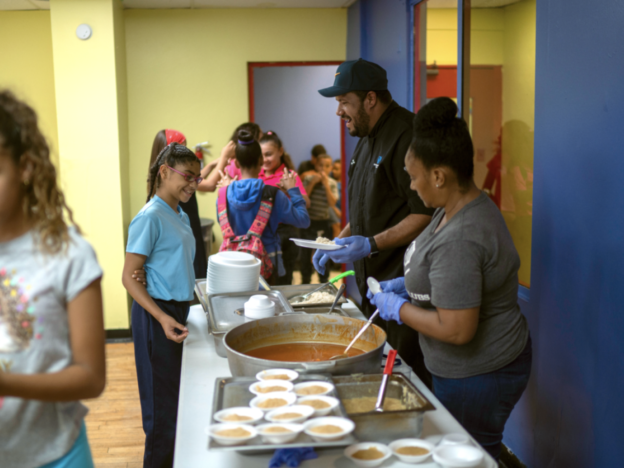volunteers serving food