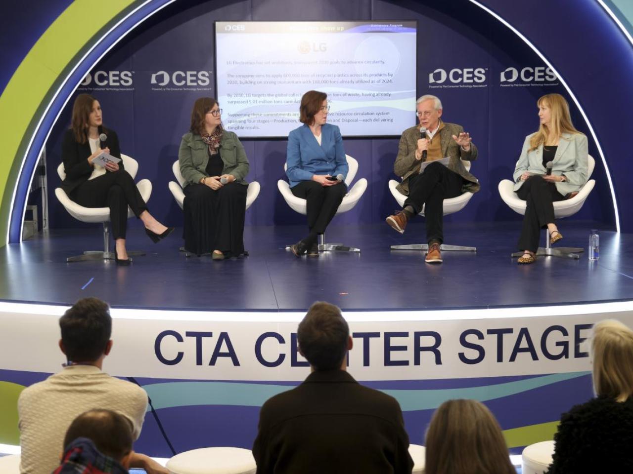 panel of people sitting on a stage