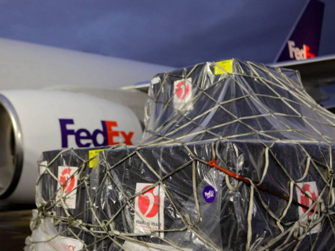 A large package outside a FedEx airplane