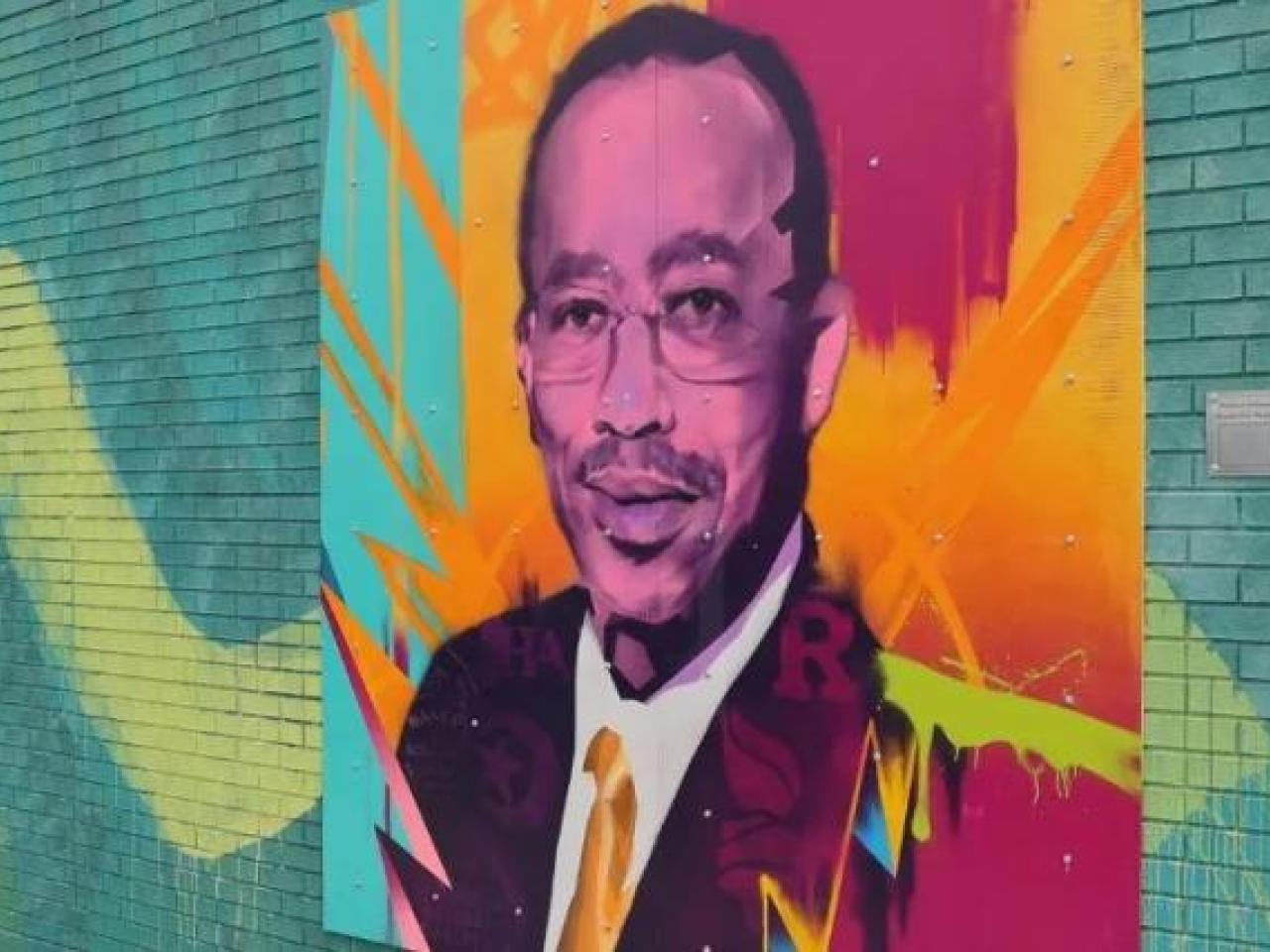 colorful mural on brick wall