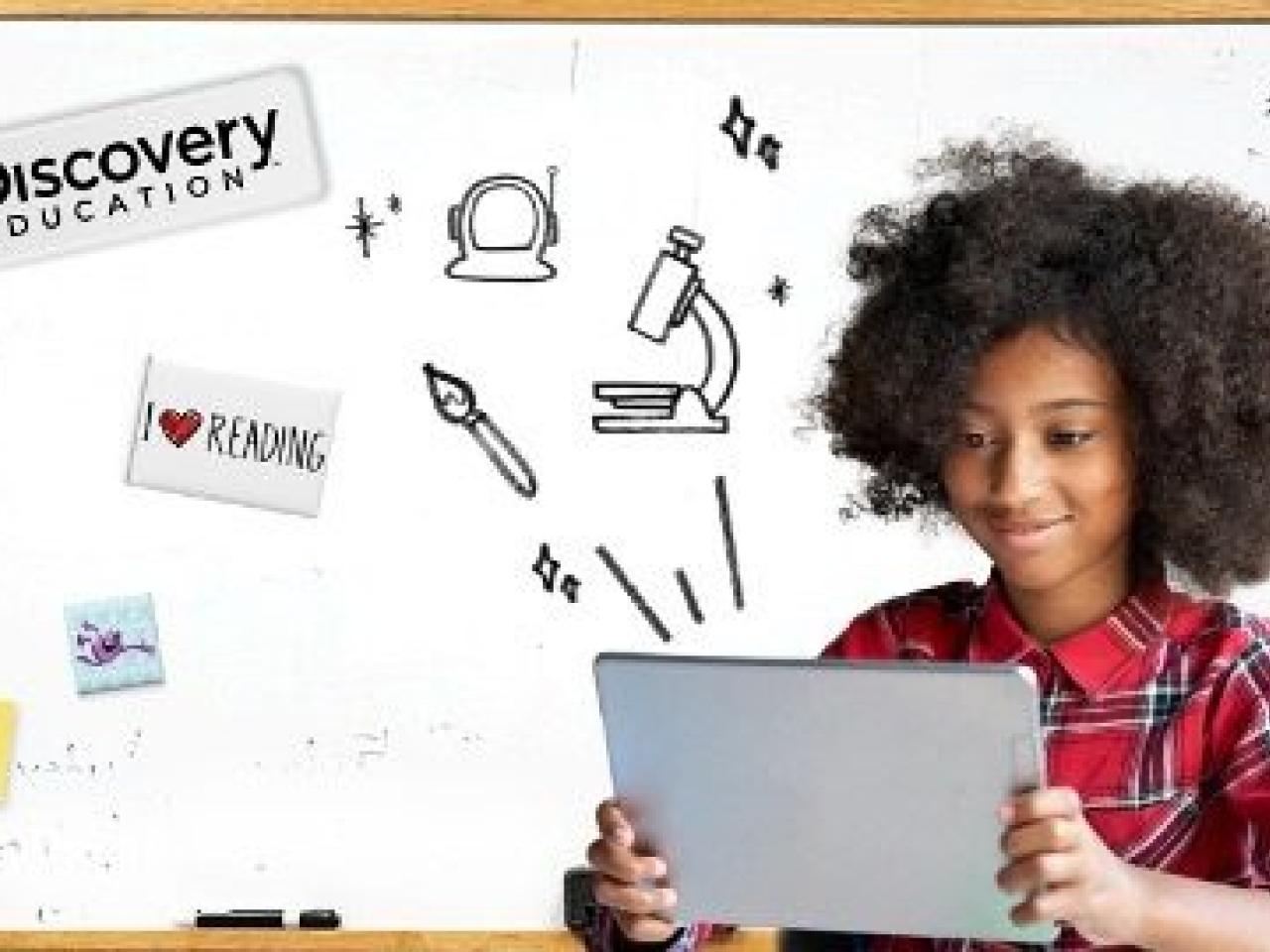 A child looking at a tablet, with various graphic icons