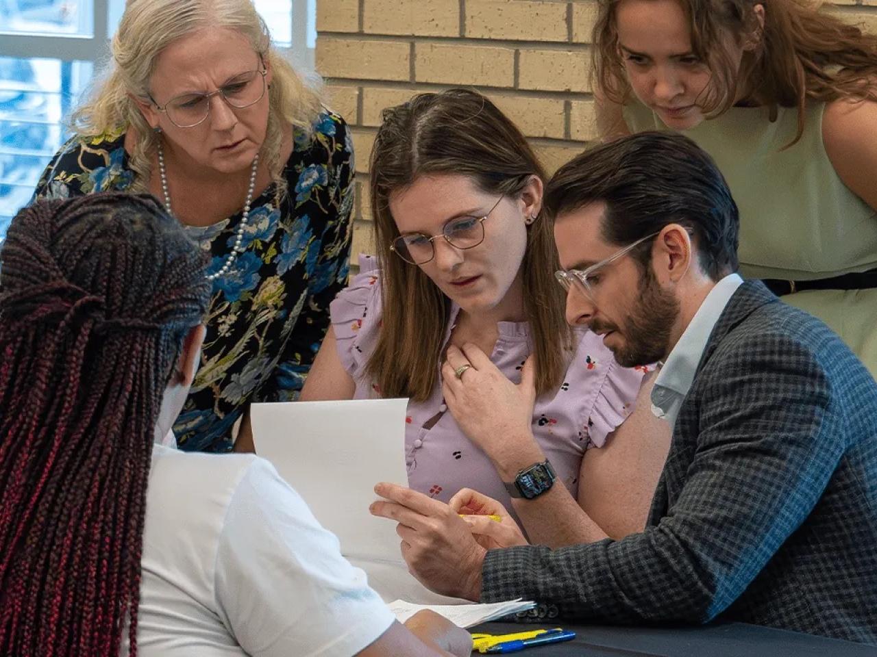 people working at event