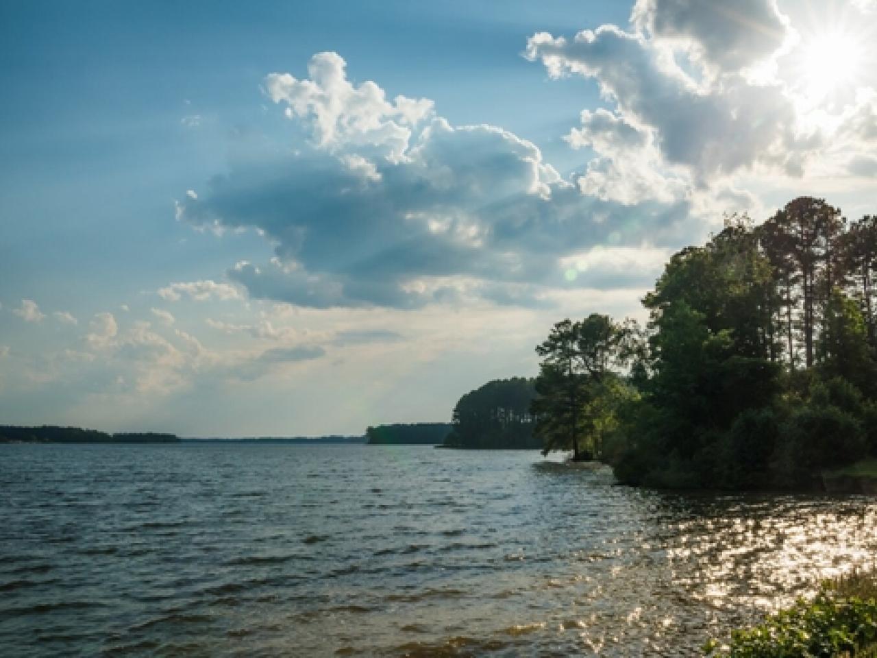 Sun shining over island landscape