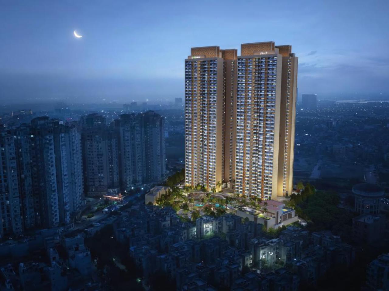 A tall, illuminated building at night