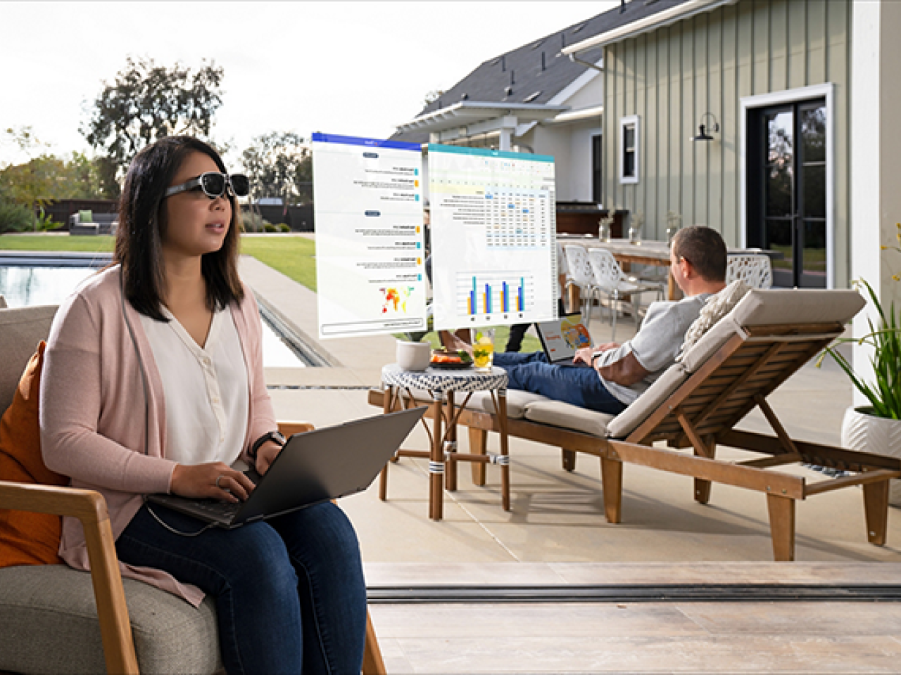 Woman in AR glasses looking at screens